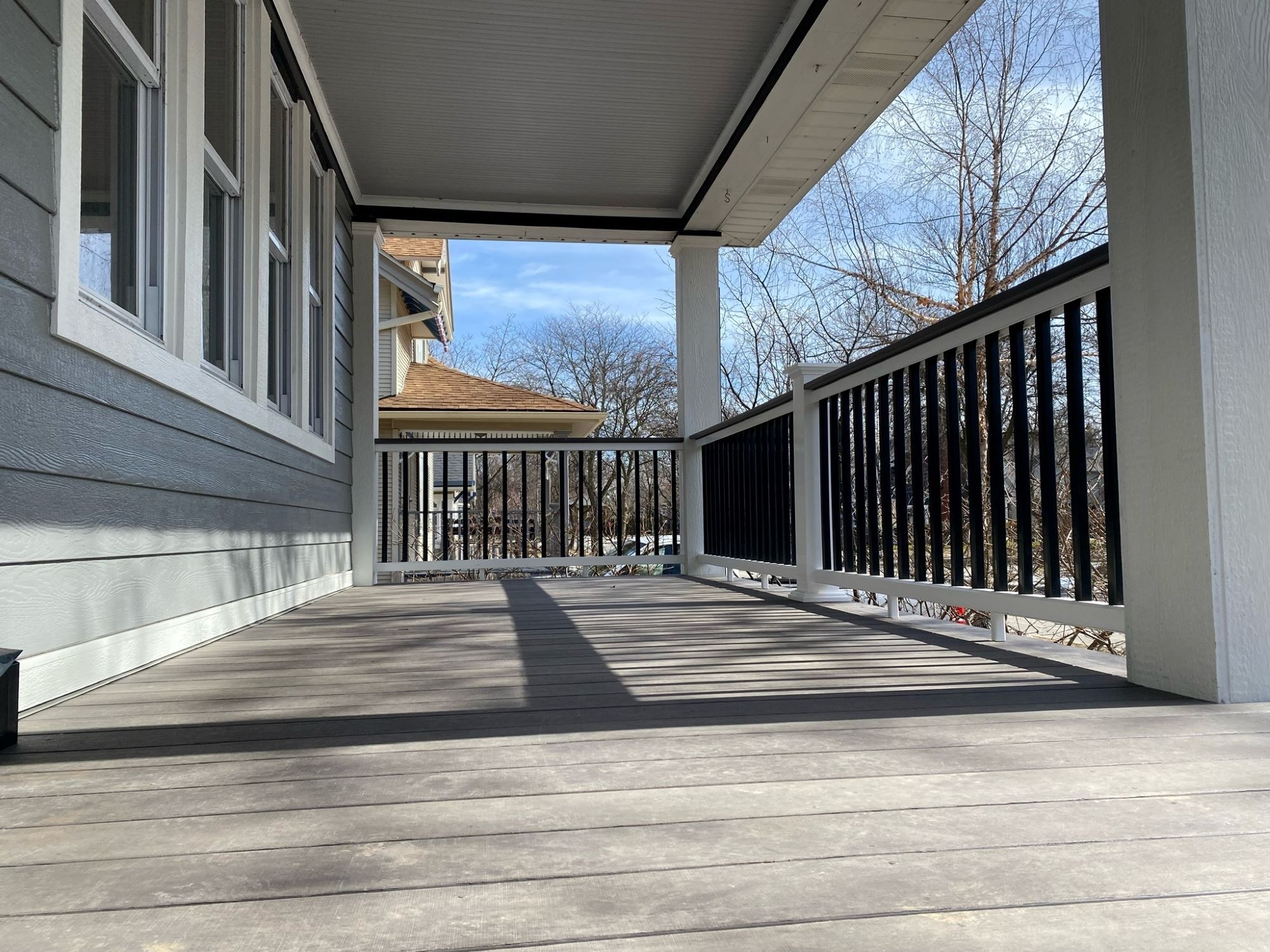 New Wooden Porch to Match House's Exterior Design