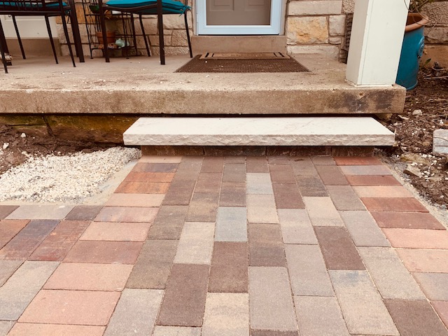 Brick paver walkway with step 