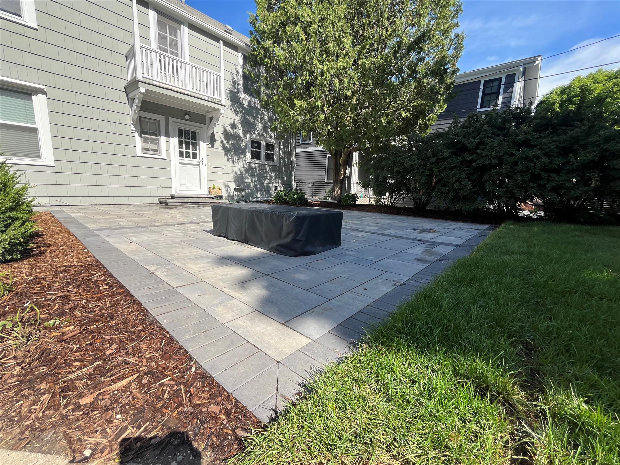Shaded Patio with Firepit and Tree Shade