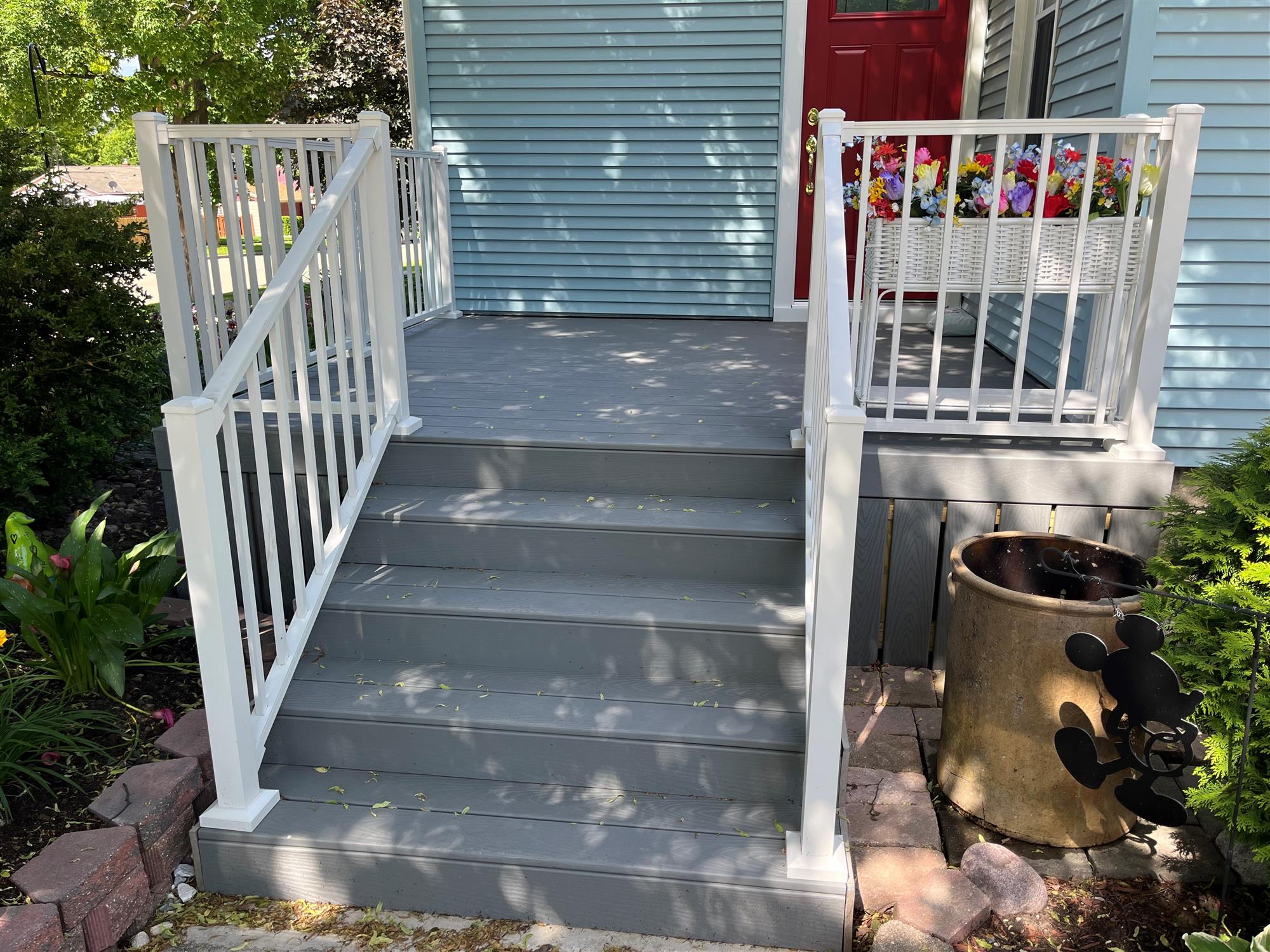 Deck with Built-In Planters and Vibrant Flowers