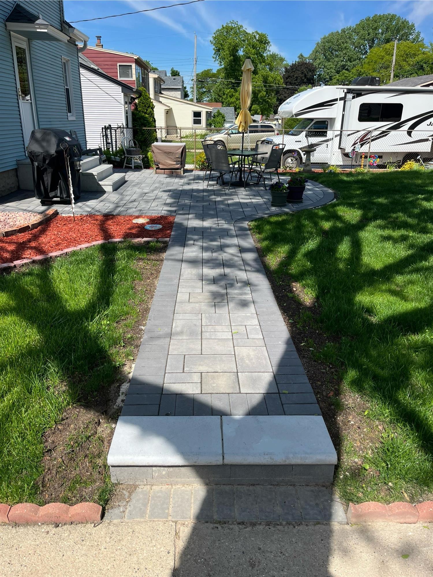 Stone Pathway Leading to Cozy Patio