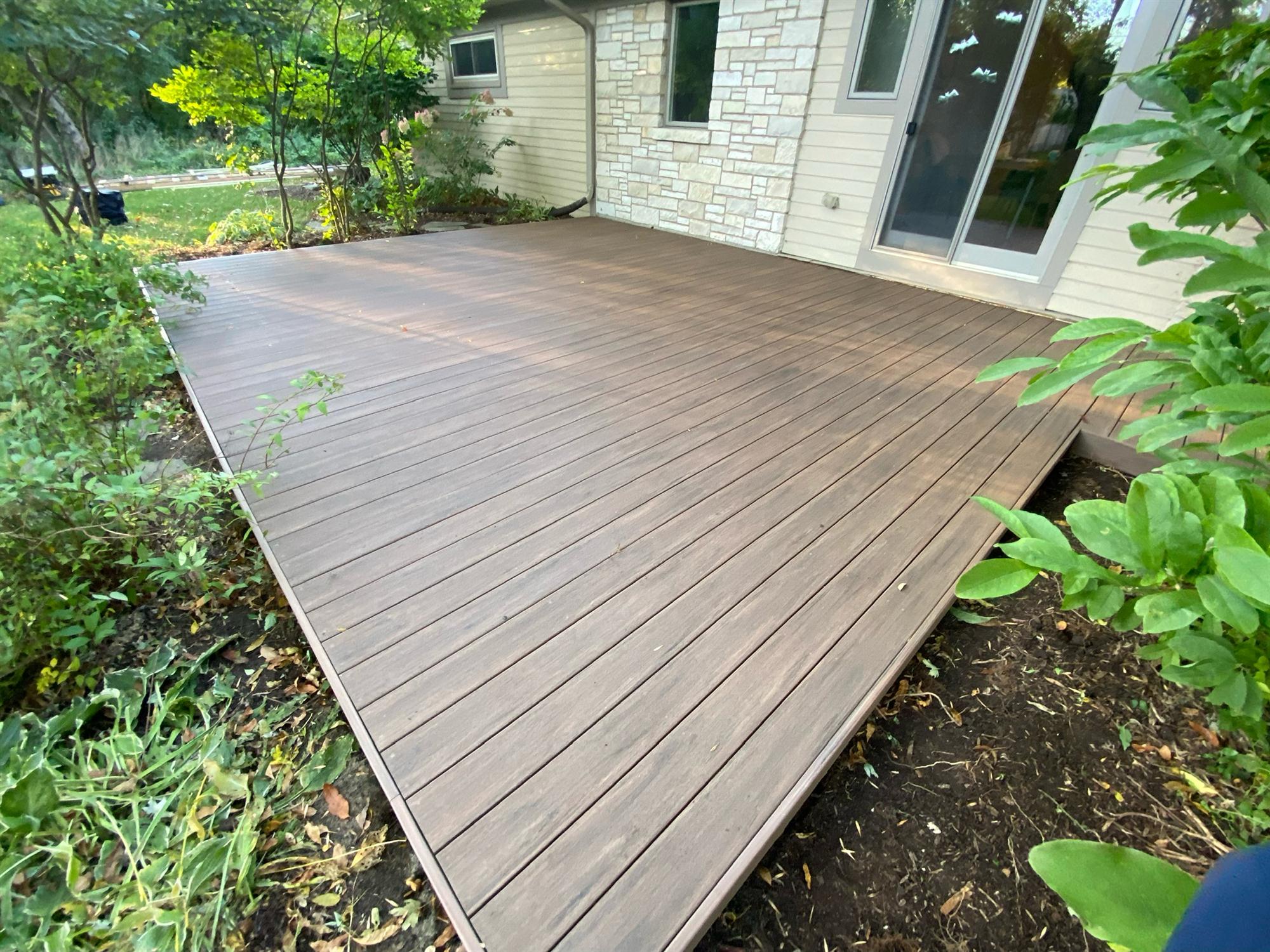 Ground-Level Wood deck in backyard
