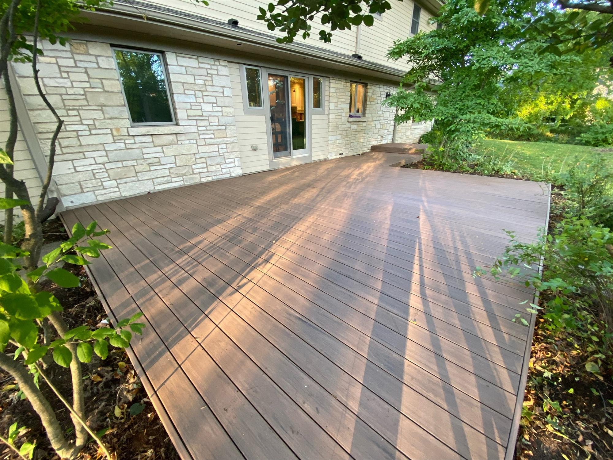 Wooden deck in back of house