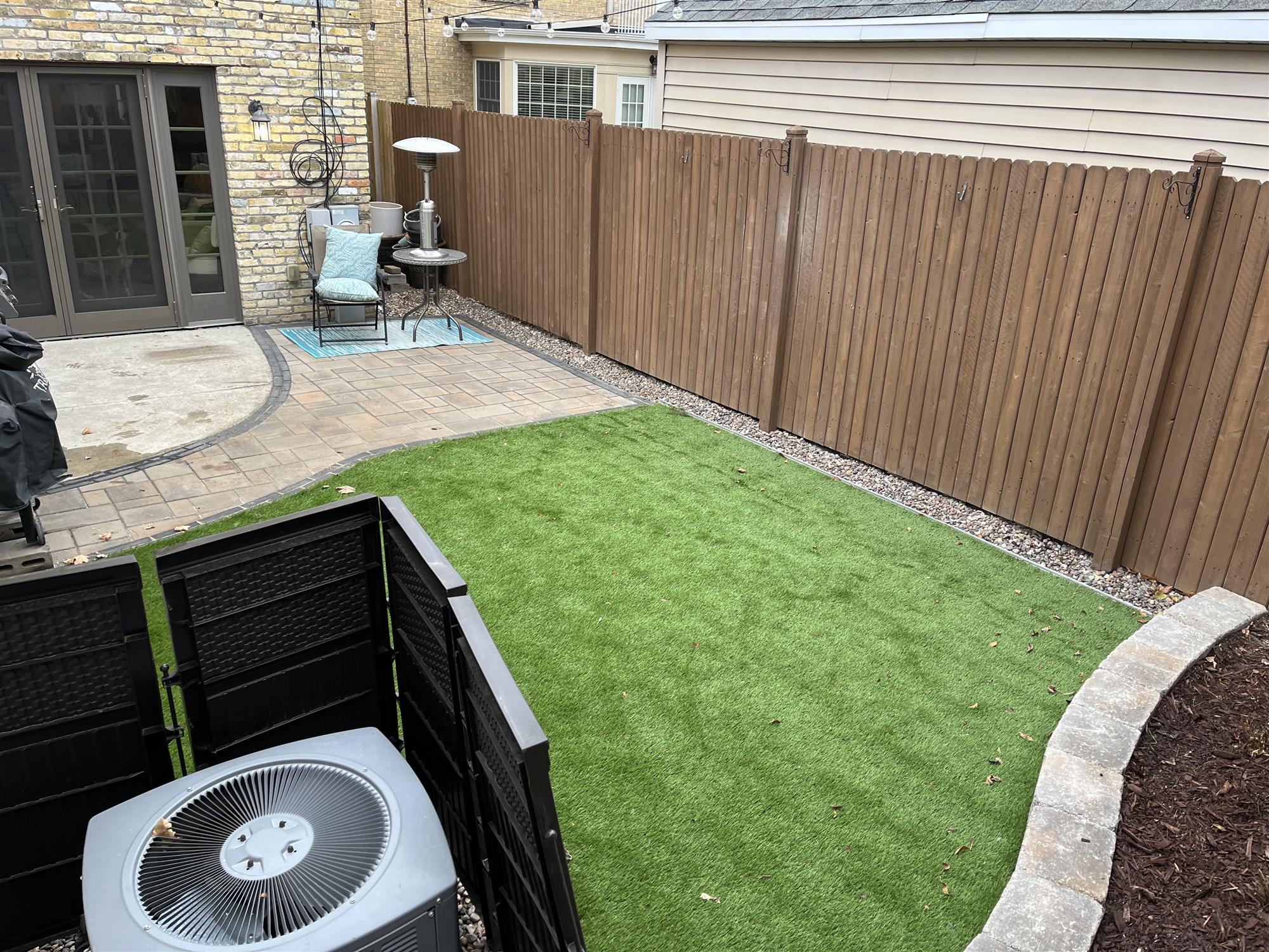 Turf lawn addition to small backyard