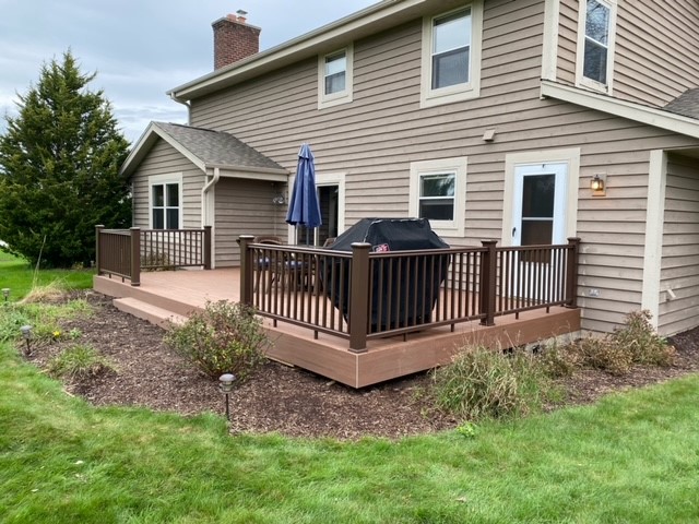 Backyard deck attached to house