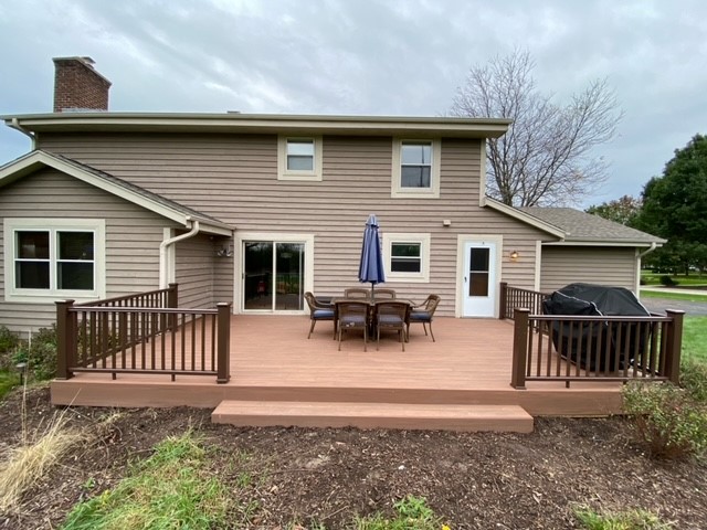 Wooden deck for sitting and grilling