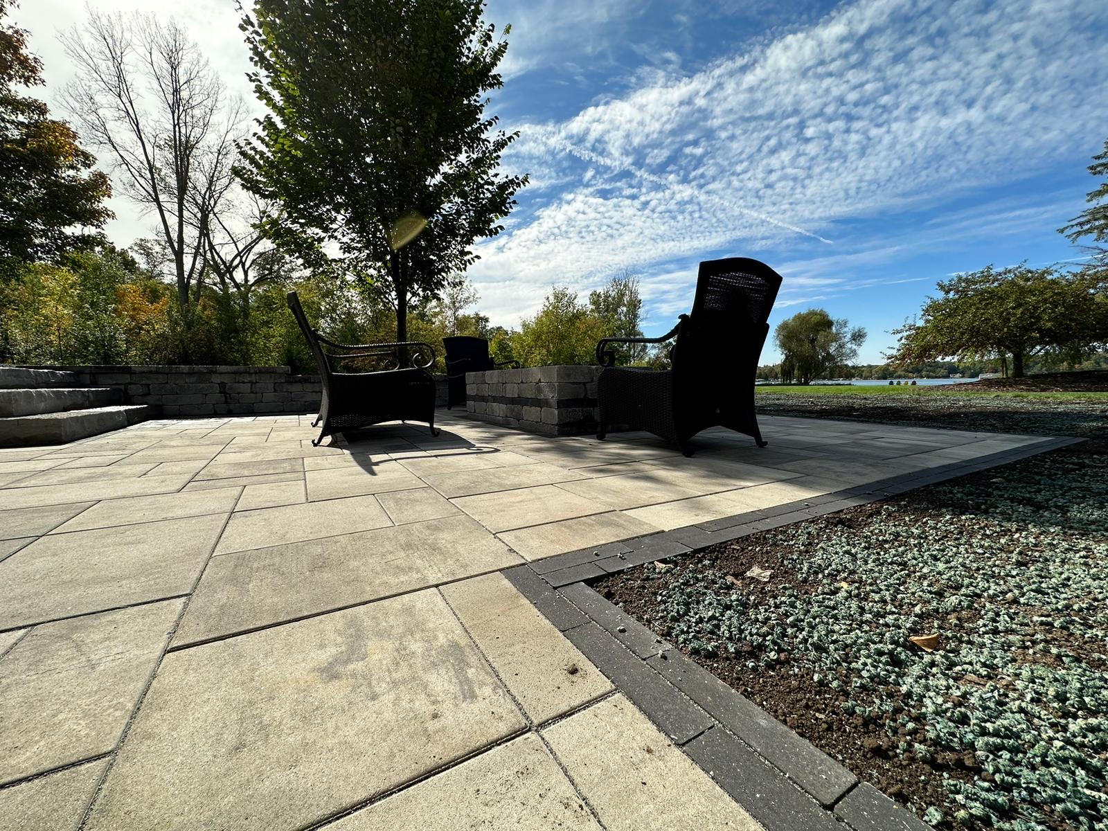 Patio with a Fire Pit with a Great View of a Lake