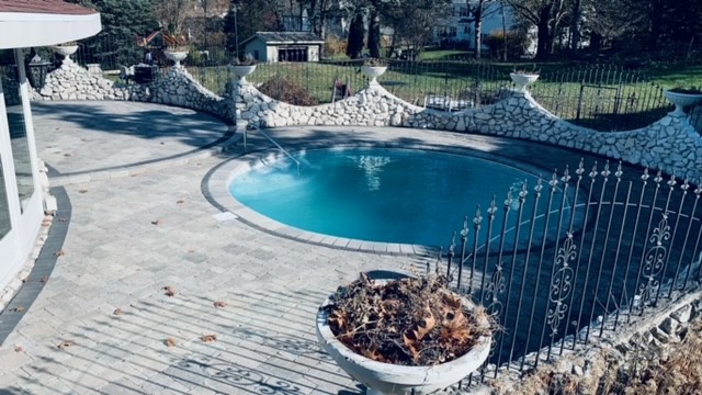 Stone patio with stone walls