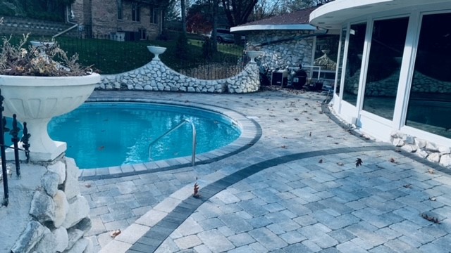 Stone patio with swimming pool 